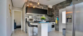 Three bedroom top apartment by the beach